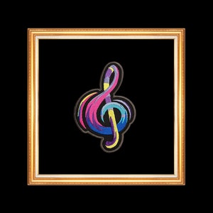 May include: A colorful embroidered treble clef patch in a gold frame. The patch is made of pink, blue, yellow, and purple thread.