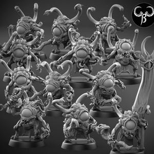 May include: A collection of detailed, gray miniature fantasy creatures with large central eyes, multiple tentacles, and menacing expressions. Some figures hold weapons or have open mouths. The figures are on small, round bases, suggesting they are tabletop game miniatures.