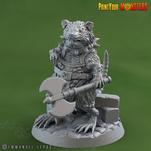 May include: A gray 3D printed miniature of a rat-like creature wearing armor and wielding an axe. The creature has a spiky collar and a fierce expression. The miniature is set on a circular base with a rough texture.