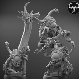 May include: Three detailed, grayscale fantasy miniatures of grotesque creatures with large, central eyes, sharp teeth, and multiple appendages. One figure holds a tall, ornate staff. The miniatures are on small, round bases.