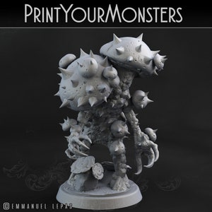 May include: A gray 3D printed miniature of a mushroom monster with multiple spiky mushroom caps and a textured body. The monster has a base and is standing on a gray surface. PRINTYOURMONSTERS is printed on the background.