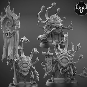 May include: A collection of detailed, grayscale fantasy miniatures. The figures depict monstrous creatures with multiple eyes, tentacles, and grotesque features. One figure holds a staff with an eye symbol, while another clutches a scroll. The miniatures are on display.