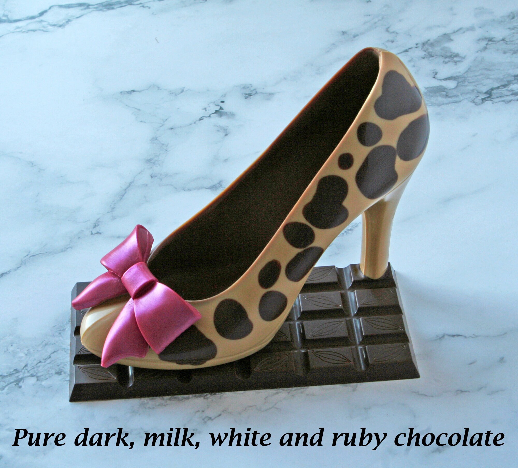 High heel shoes made of chocolate at a specialist shop in Amsterdam,  Holland Stock Photo - Alamy