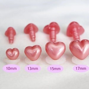 May include: Five pink heart-shaped plastic safety eyes in different sizes: 10mm, 13mm, 15mm, and 17mm. These are great for plush toy making and craft projects.