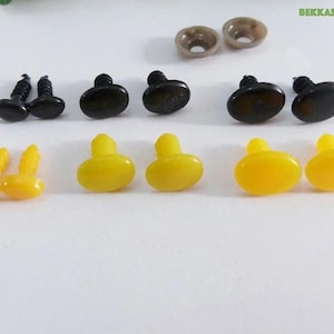 May include: Assortment of plastic safety eyes for crafts. The eyes come in two sizes and two colors: black and yellow. The eyes have a screw-on back for easy attachment.