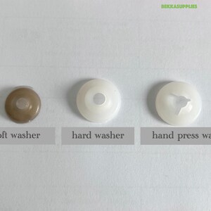 May include: Three plastic washers, one brown, one white, and one white with a hand press design. The washers are labeled "soft washer", "hard washer", and "hand press washer".