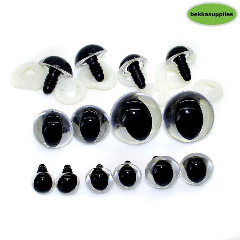 May include: Assortment of black plastic safety eyes for crafts. The eyes come in various sizes and have clear plastic pupils. Some eyes have a screw back for attaching to stuffed animals or other projects.