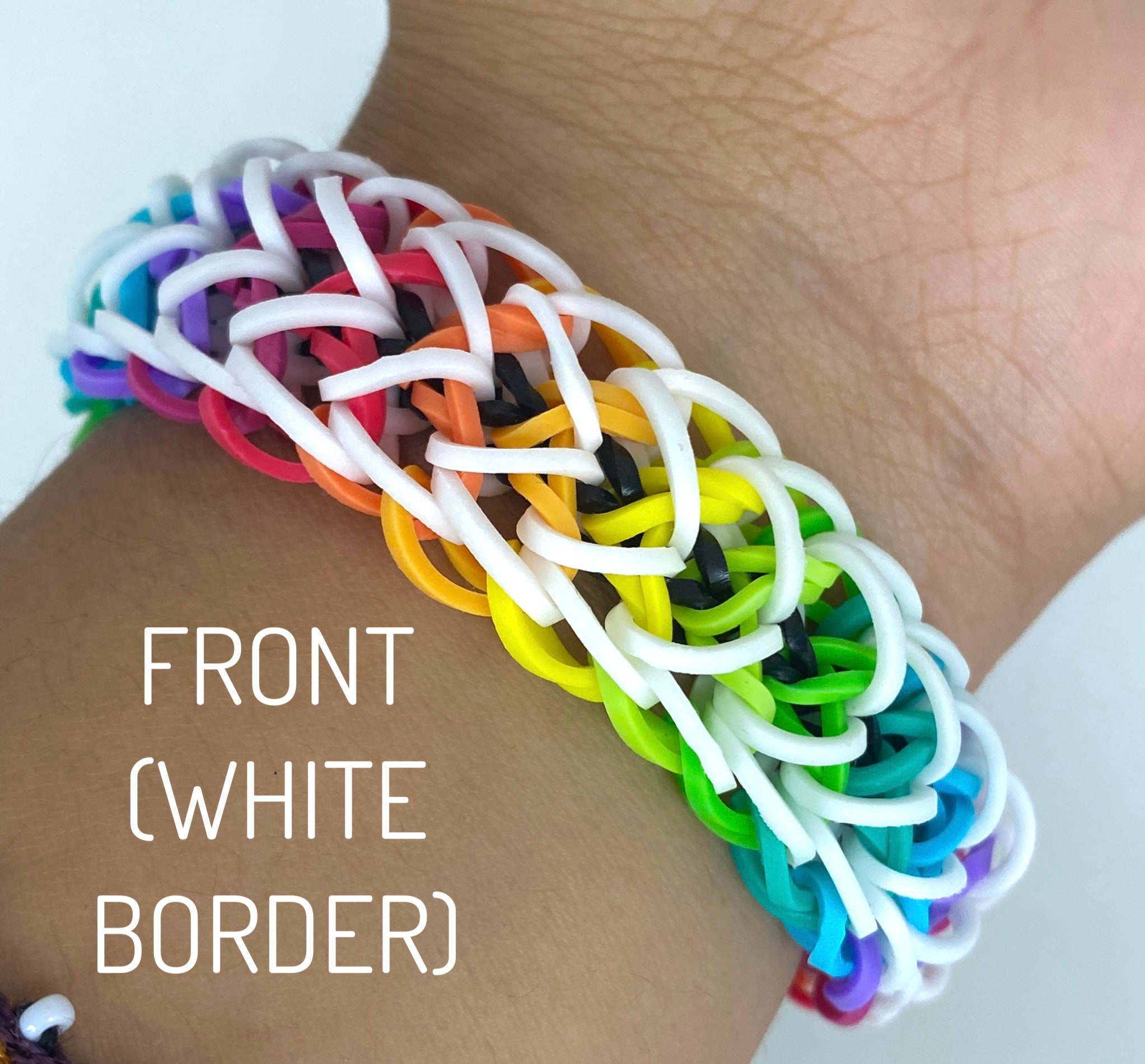 colorful rainbow colors rubber bands loom bracelet on black background,  Stock Photo, Picture And Low Budget Royalty Free Image. Pic. ESY-028995190