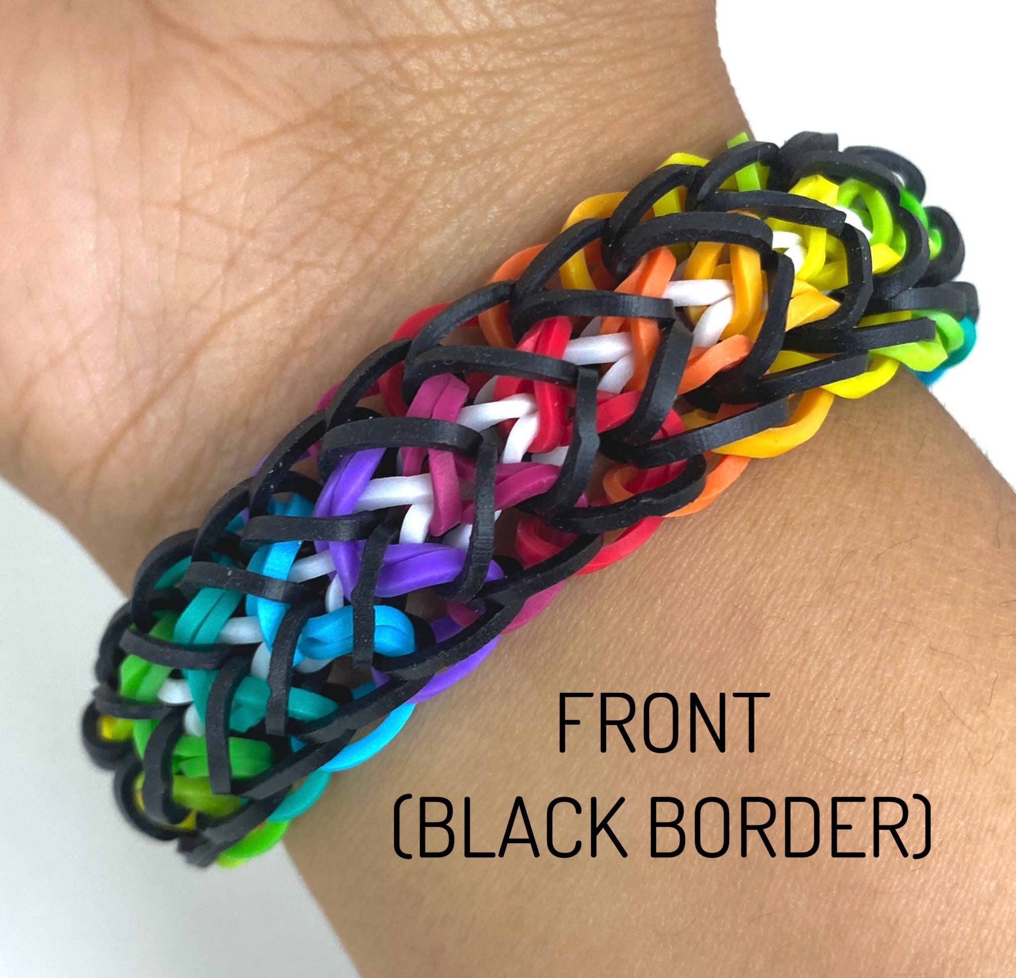 colorful rainbow colors rubber bands loom bracelet on black background,  Stock Photo, Picture And Low Budget Royalty Free Image. Pic. ESY-028995190