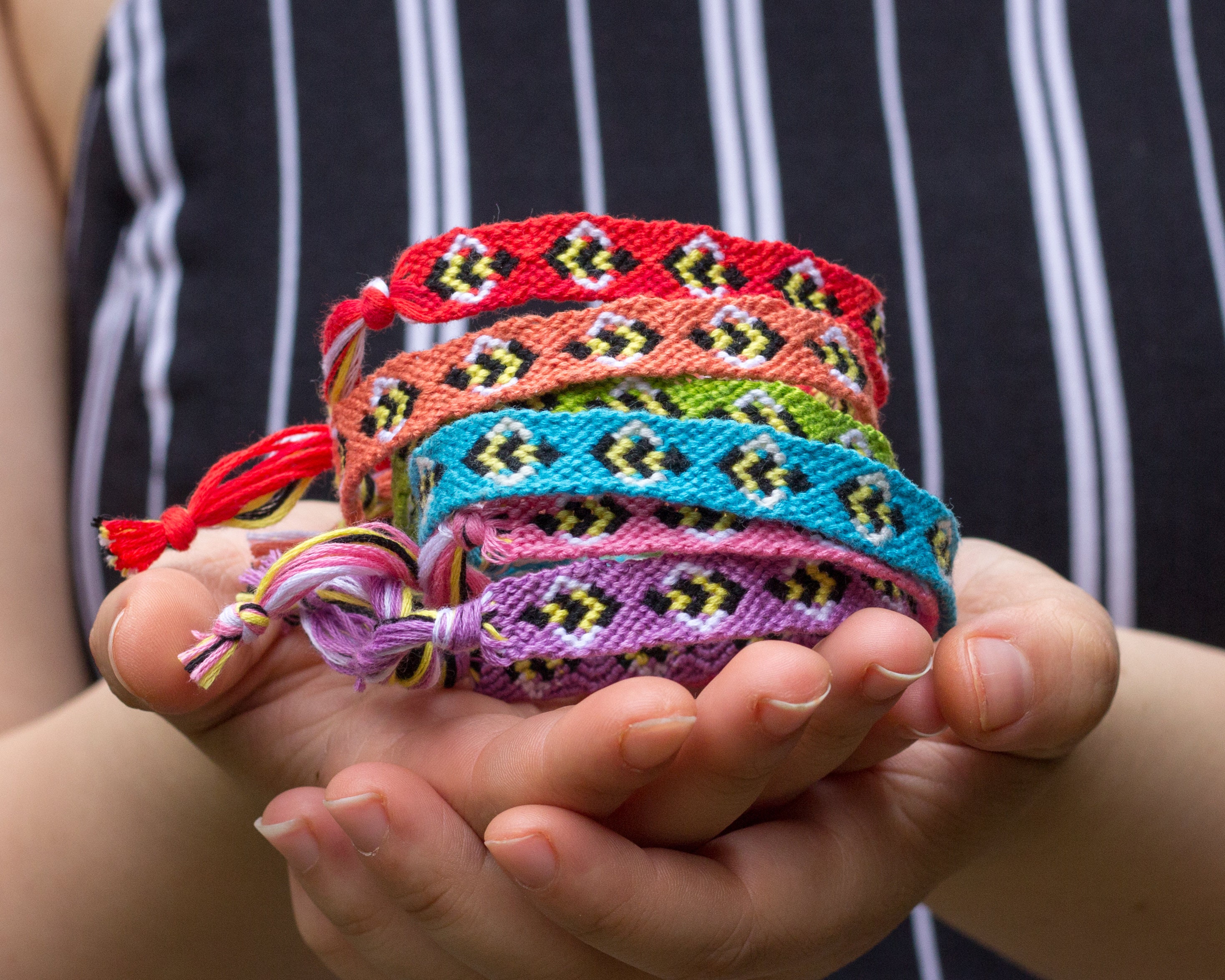 Premium Photo | Woven diy friendship bracelets in green colors