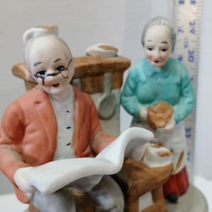 Vintage Porcelain Grandparent Music Box: Rotating Senior Couple Figurine