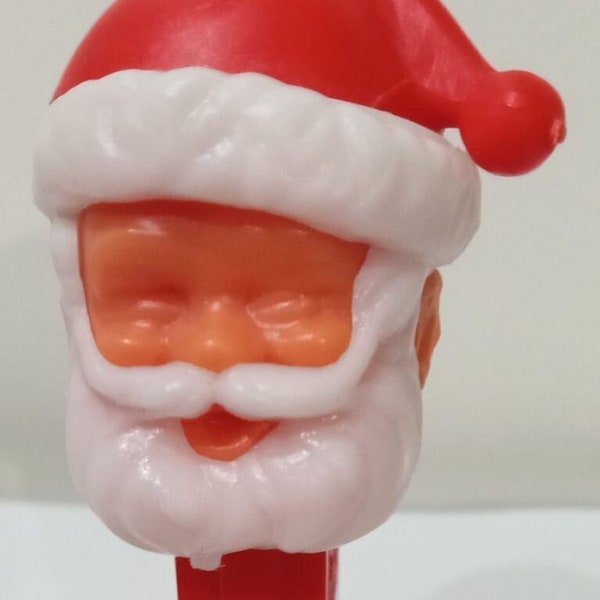 PEZ Vintage Santa Claus PEZ Dispenser Collectible Toy w/ Feet and Eyes Closed Made In Yugoslavia