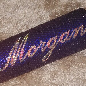 Primary Color: Blue
Secondary (Name) Color: Crystal AB
Script: Palace Script MT
