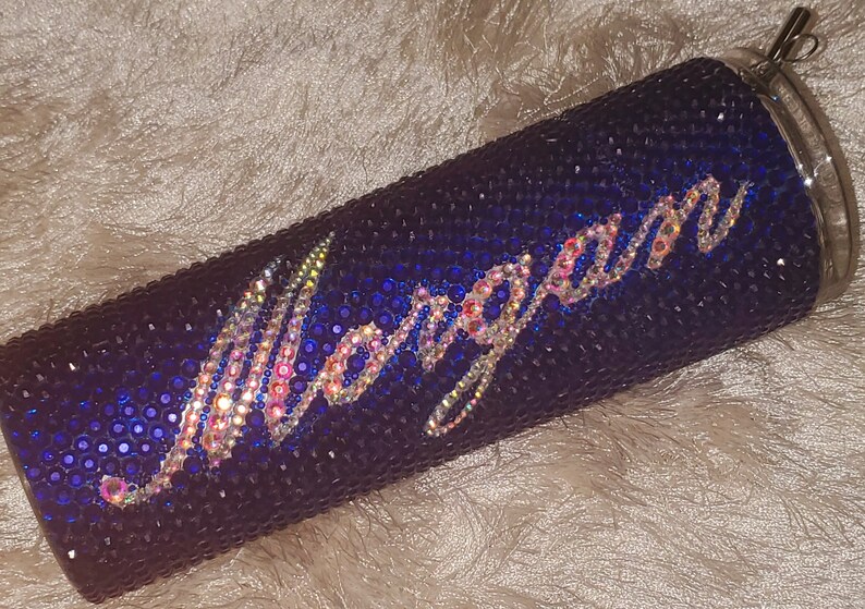 Primary Color: Blue
Secondary (Name) Color: Crystal AB
Script: Palace Script MT