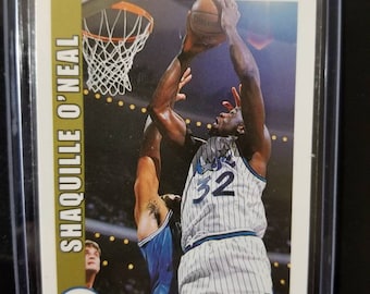 Shaquille ONeal! Orlando magic lakers heat 4x nba champion mvp tnt cohost! Cultural icon phenomenon. Shaquille O'Neal 1992 rookie mint