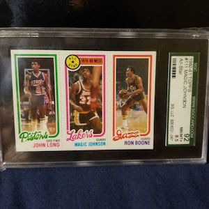 Magic Johnson ! Meilleurs joueurs de l'histoire de la NBA. Lakers mvp 5x champion du temple de la renommée nba. Earving Magic Johnson 1980 topps rookie sgc noté 92