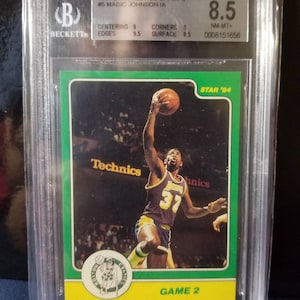 Magic Johnson ! Meilleurs joueurs de l'histoire de la NBA. Lakers mvp 5x champion du temple de la renommée nba. Earving Magic Johnson 1984 star finale insert bgs 8.5