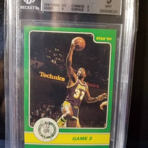 Magic Johnson ! Meilleurs joueurs de l'histoire de la NBA. Lakers mvp 5x champion du temple de la renommée nba. Insert final Earving Magic Johnson 1984 noté bgs 9
