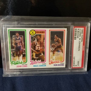 Magic Johnson ! Meilleurs joueurs de l'histoire de la NBA. Lakers mvp 5x champion du temple de la renommée nba. Earving Magic Johnson 1980 surpasse une recrue psa classée 9