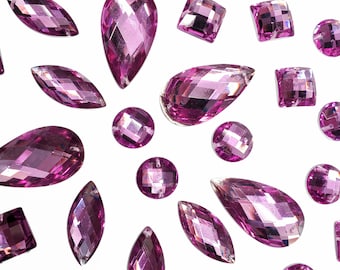 May include: Assortment of purple iridescent glass rhinestones in various shapes and sizes, including teardrop, round, square, and oval.