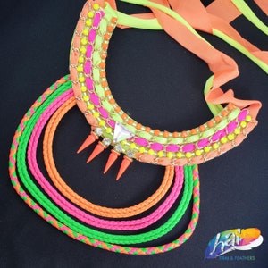 Neon Color Carnival Necklace with Gold Chain, Neon Color Cup Chain and Braided Rope Hanging on White Felt Backing