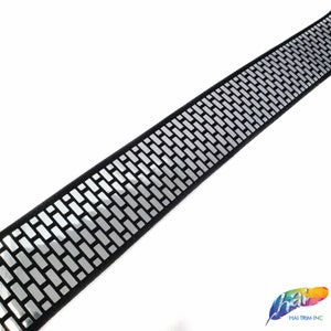 May include: Black trim with a silver reflective brick pattern.