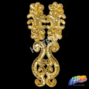 May include: Gold sequined appliqué with a floral design. The appliqué is made of small, round sequins and has a delicate, intricate pattern.