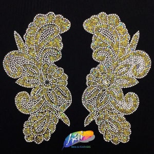 May include: Two gold and silver rhinestone embellishments in the shape of a butterfly. The embellishments are perfect for adding sparkle to clothing, accessories, or home decor.