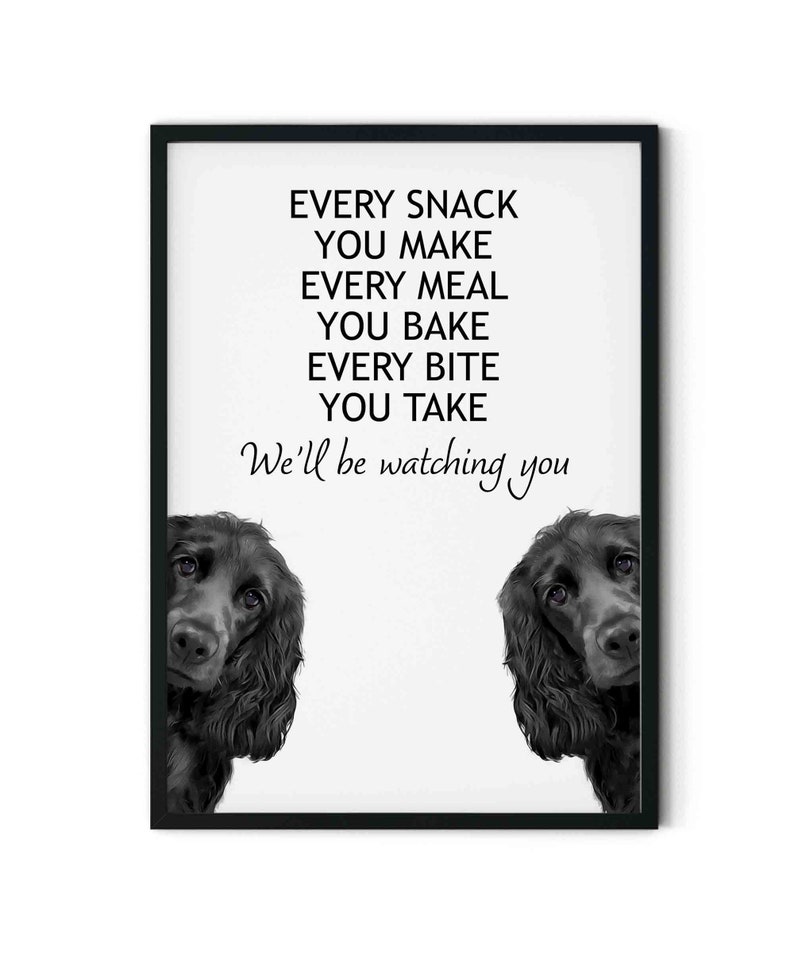 May include: Black and white illustration of two dogs peeking from the sides of a white frame with the text "EVERY SNACK YOU MAKE EVERY MEAL YOU BAKE EVERY BITE YOU TAKE We'll be watching you".