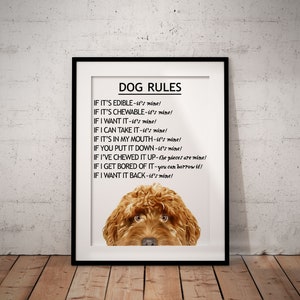 May include: A printable poster featuring a brown dog peeking out from the bottom. The poster has the text "DOG RULES" and a list of rules for dogs, such as "If it's edible - it's mine!" and "If I want it back - it's mine!"