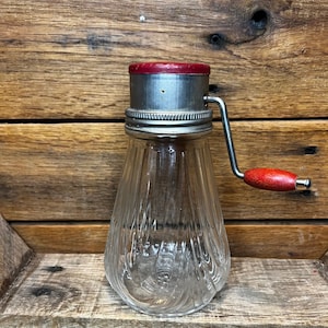 1930s vintage nut grinder, old red paint metal hand crank nut