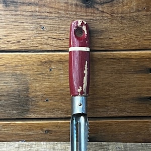 Vintage A&J Red with White Stripe Handle Peeler
