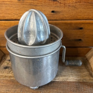Vintage rotary metal citrus juicer, gem squeezer, farmhouse