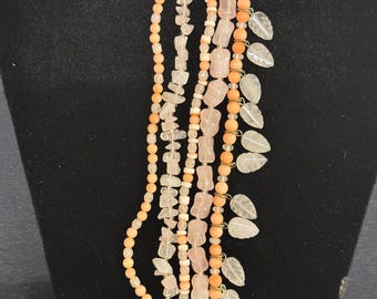 Bracciale vintage Graziano a cinque fili con corallo melone e quarzo rosa.