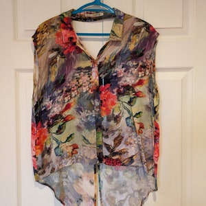 Stussy multi colored cut out shirt
