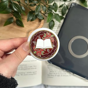 Red Book Kindle-/telefoongreep | Magisch | Hard email | Tabletten | Mobiele telefoons