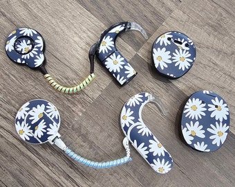 Daisies: Skins for MedEl, Cochlear, Advanced Bionics, Oticon, Phonak, and Dexcom