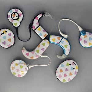 Rainbow Hearts: Skins for MedEl, Cochlear, Advanced Bionics, Oticon, and Phonak