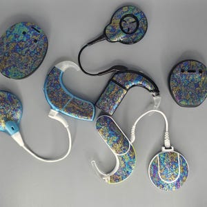 Oil Slick: Skins for MedEl, Cochlear, Advanced Bionics, Oticon, and Phonak