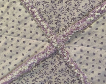 Soft and cozy lavender and cream rag quilt