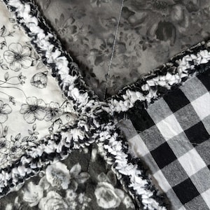 Farmhouse style black and white rag quilt