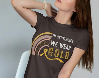 In September We Wear Gold Rainbow Shirt, Childhood Cancer Awareness T-Shirt, Cancer awareness tshirt, We wear gold shirt, gold ribbon shirt