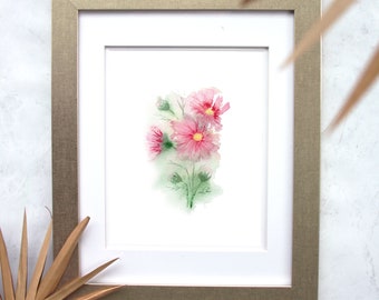 Peut inclure: Une peinture à l'aquarelle encadrée de fleurs de cosmos roses avec des tiges et des feuilles vertes sur un fond blanc.