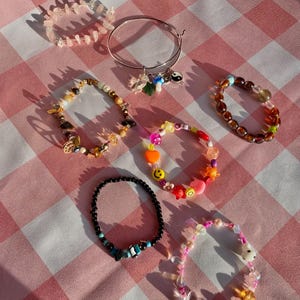 Beaded Bracelets Unique Handmade Jewelry With Iridescent Glass Beads Stretchy with Metal and Glass Elements Original Handcrafted Accessories