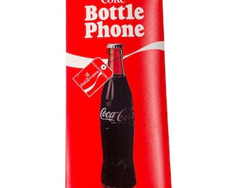 Telefono elettronico con filo a forma di bottiglia di Coca-Cola, modello 5000, vintage 1983.