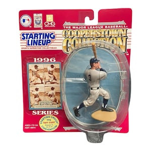May include: A 1996 Starting Lineup Cooperstown Collection baseball figure of Harmon Killebrew in a clear plastic case. The figure is wearing a gray uniform with the number 3. The packaging is red with the Major League Baseball logo.