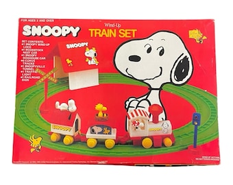 Tren de cuerda Snoopy, circa 1965, nuevo en caja