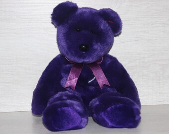 purple bear with white rose