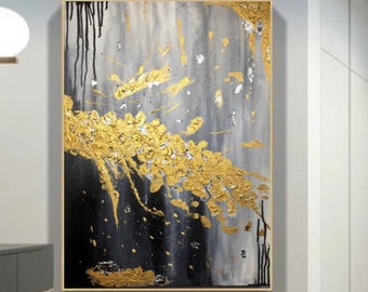 May include: Abstract painting with black, white, and gold paint. The painting has a textured surface and features a large gold splatter design.