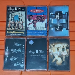 May include: Six cassette tapes with different album covers featuring the musical group Boyz II Men. The album titles include "Cooleyhighharmony", "End of the Road", "Legacy", and "Full Circle".